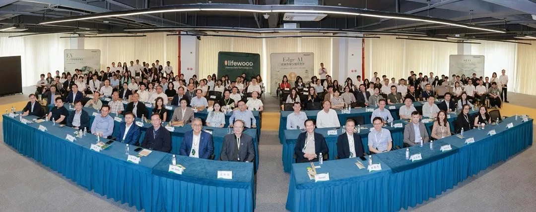 A full room of attendees seated at Lifewood Tech Talk 2026, Songshan Lake, Dongguan, with Lifewood and Edge AI stage banners behind them.