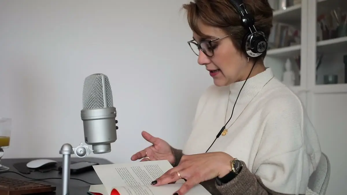 A contributor reading a prompt aloud for speech data collection