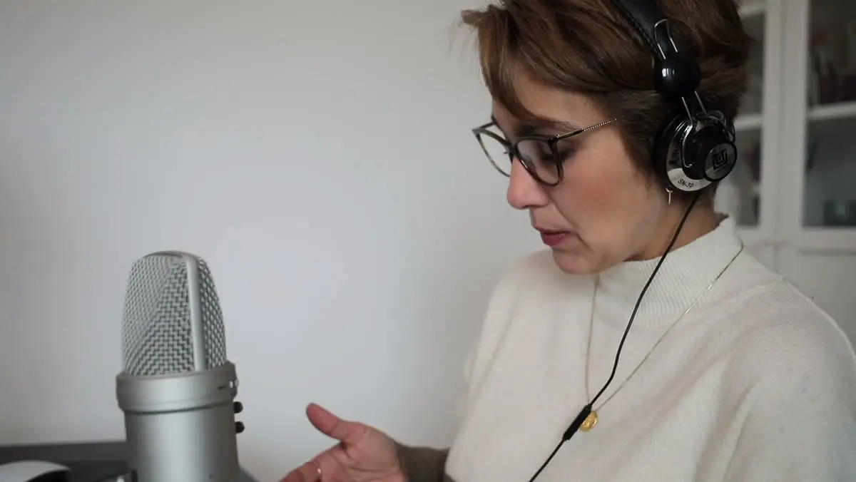 A native speaker recording with a studio microphone